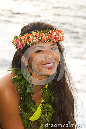 Hawaiian girl with flowers on lava Stock Photo