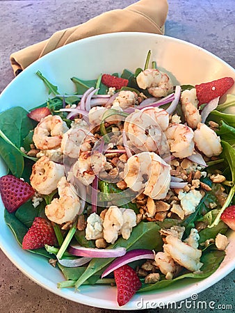 Hawaiian lunch salad with shrimp, greens and strawberries Stock Photo