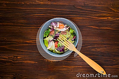 Hawaiian plate of salmon Poke with spicy. Homemade food. The concept of tasty and healthy meal. Copy space,wooden background Stock Photo