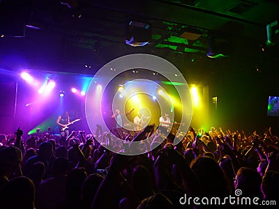 Hawaiian Style band the Green gets the crowd to wave hands in ai Editorial Stock Photo