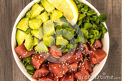 Hawaiian Style Tuna And Avocado Sashimi Poke Food Bowl Stock Photo