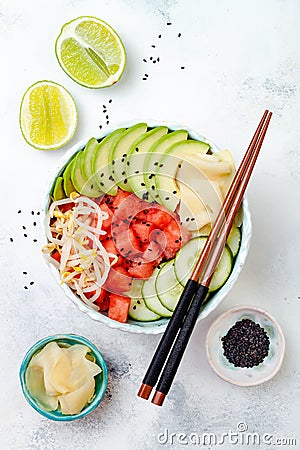 Hawaiian watermelon poke bowl with avocado, cucumber, mung bean sprouts and pickled ginger. Top view, overhead Stock Photo