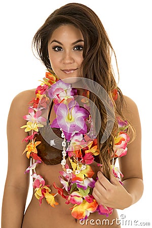 Hawaiian woman coconut bra close slight smile Stock Photo