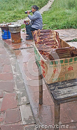 Hawkers and peddlers selling food and grocery in walking street Editorial Stock Photo