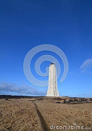 Hay Field Near Malarrif Lighthouse in Iceland Stock Photo