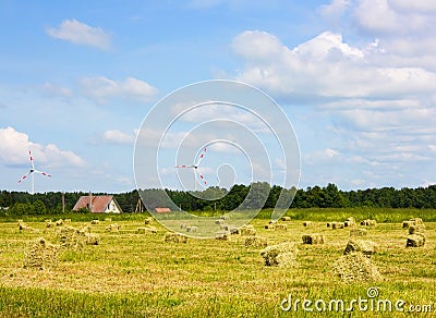 Hay field, wind generators Stock Photo