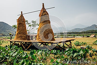 Hay, haystack, agriculture, cart. Rural landscape, farm village. Beautiful asian landscape Stock Photo