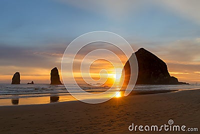 Haystack Rock at Cannon Beach during Sunset Stock Photo