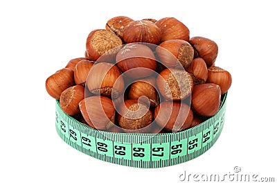 Hazelnut and meter Stock Photo