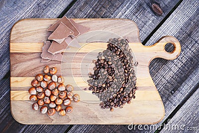 Hazelnuts,chocolate and coffee beans Stock Photo