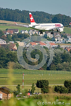 HB-JCC Swiss Bombardier CS-300 jet in Zurich in Switzerland Editorial Stock Photo