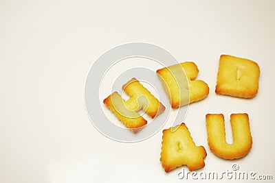 HBD 4U Happy birthday for you word from alphabet biscuits on white background Stock Photo