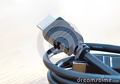 HDMI cable on blurred background Stock Photo