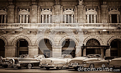 HDR - American convertible vintage cars parked lined up on the side street in Havana Cuba - Ret Editorial Stock Photo