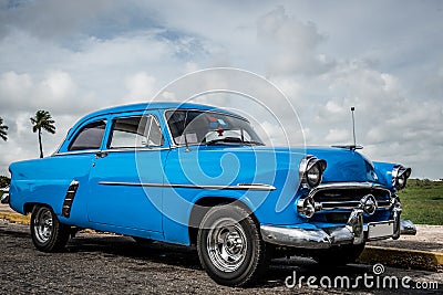 HDR Cuba blue american classic car parked Editorial Stock Photo