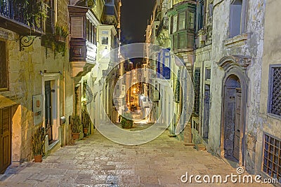 HDR night photo of a historic street of the Valletta city, capital of Malta Editorial Stock Photo