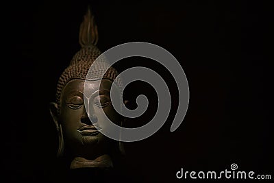 Head Buddha statue with aura used as amulets of Buddhism religion Stock Photo