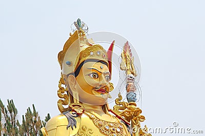 Head of golden Guru Rinpoche statue Stock Photo