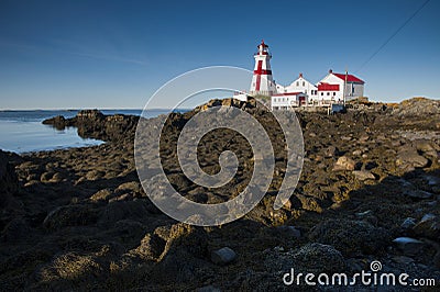 Canadian Lighthouse Protects During Low Tide Stock Photo