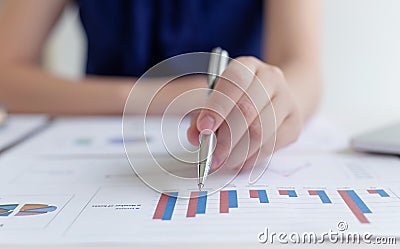 Head of marketing has analyzed the financial income graph of the company in order to develop the structure of the company to be re Stock Photo