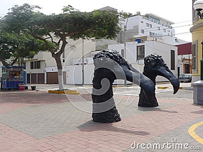 Head and neck of bird black statues in Barranco, Lima Editorial Stock Photo