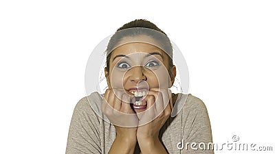 Head portrait of young crazy happy and excited hispanic woman 30s in surprise and astonish face expression with eyes wide open Stock Photo