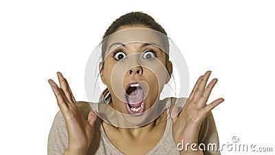 Head portrait of young happy and excited hispanic woman 30s in surprise and astonished face expression eyes and mouth wide open is Stock Photo