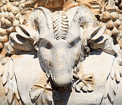 Head of the ram, stone ancient vase decoration Stock Photo