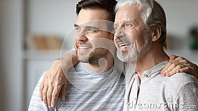 Dreamy positive two male generations family planning future. Stock Photo