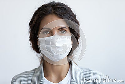 Headshot portrait woman wear face mask protecting from COVID19 Stock Photo