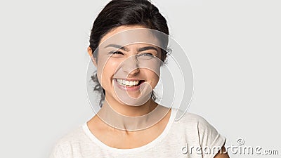 Head shot portrait excited Indian girl laughing close up Stock Photo