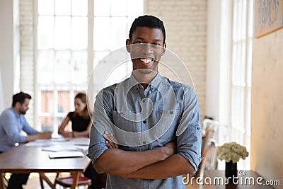 Head shot portrait of millennial skilled african american male manager. Stock Photo