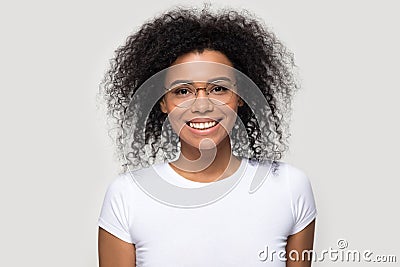 Head shot portrait smiling African American woman wearing glasses Stock Photo