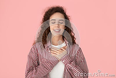 Head shot young happy grateful girl feeling relief. Stock Photo