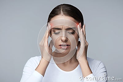 Headache. Beautiful Woman Feeling Stress And Strong Head Pain Stock Photo