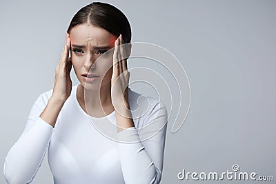 Headache. Beautiful Woman Feeling Stress And Strong Head Pain Stock Photo