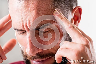 Headache or esp mind power Stock Photo