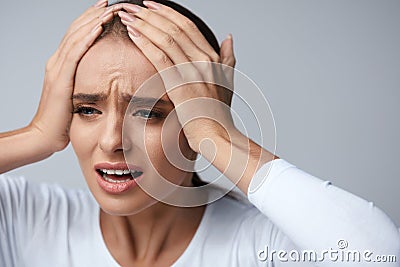 Headache Pain. Beautiful Woman With Painful Migraine, Screaming Stock Photo