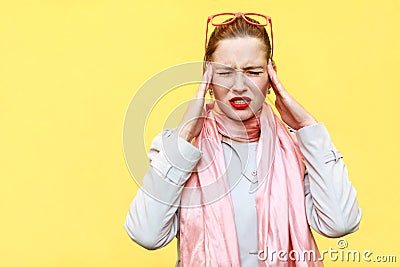 Headache or pain. Distressed woman holding hands on head and cl Stock Photo