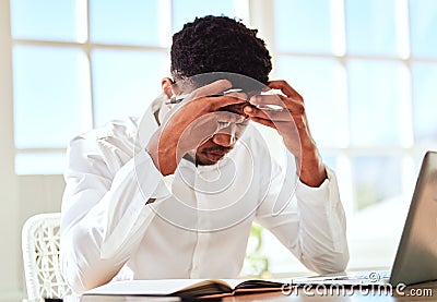 Headache, stress and businessman with burnout from work problem in office. Sad and tired corporate African employee with Stock Photo