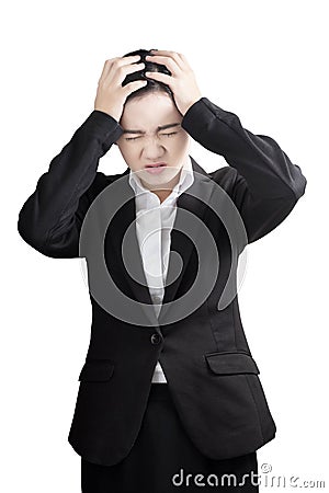 Headache symptom in a businesswoman isolated on white background. Clipping path on white background. Stock Photo