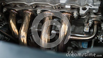 Header exhaust in car Stock Photo