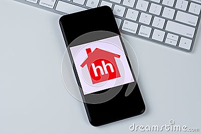 HeadHunter app logo on a smartphone screen. Editorial Stock Photo