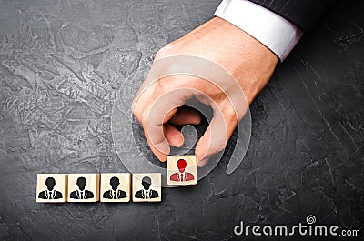 Headhunter recruits staff. The concept of finding people and workers on the job. Selection of teams, the appointment of a leader. Stock Photo