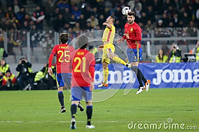 Heading duel Gerard Pique and Florin Andone Editorial Stock Photo