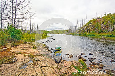 Heading out on a Lonely Lake Stock Photo