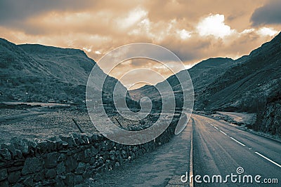 A4086 heading towards the Pass of Llanberis and Pen-y-pass. Part of the Snowdonia National Park Stock Photo