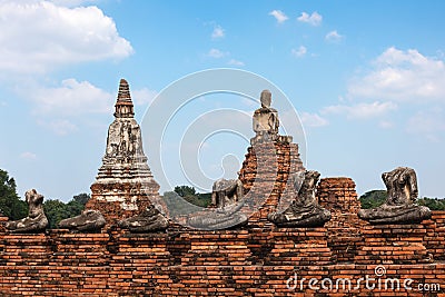 Headless ancient Buddha statues made of stone placed in row, Buddhist temple in ruins. Vintage look. UNESCO World heritage site, Stock Photo