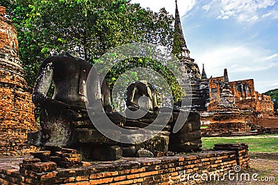 Headless Buddha in attitude of meditation statue ruins in Wat Phra Sri Sanphet Historical Park, Ayutthaya province, Thailand Stock Photo