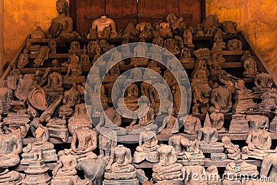 Headless Buddha statues at Wat Si Saket, Laos Stock Photo